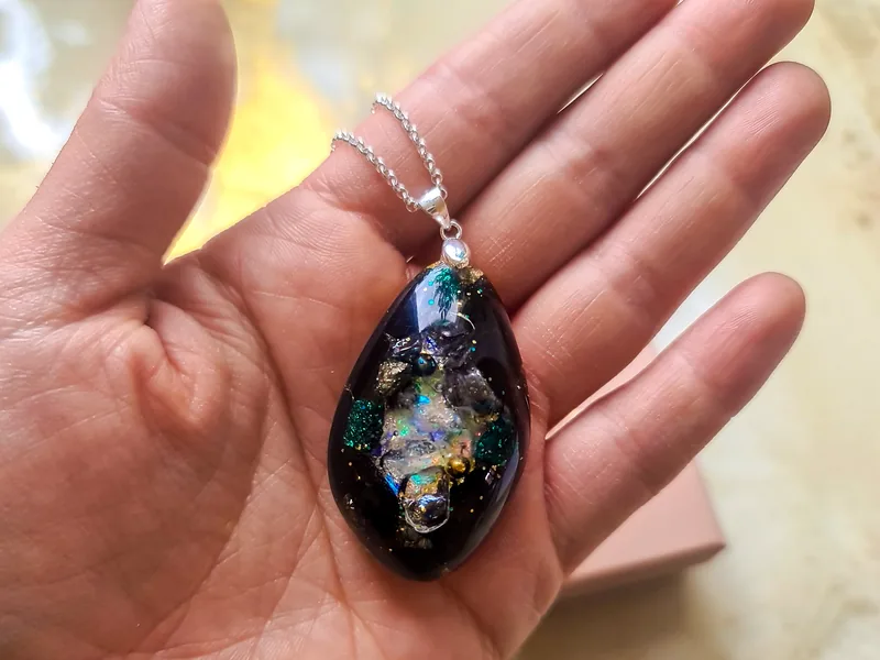 Pranadrop® handcrafted orgonite pendant worn on the body